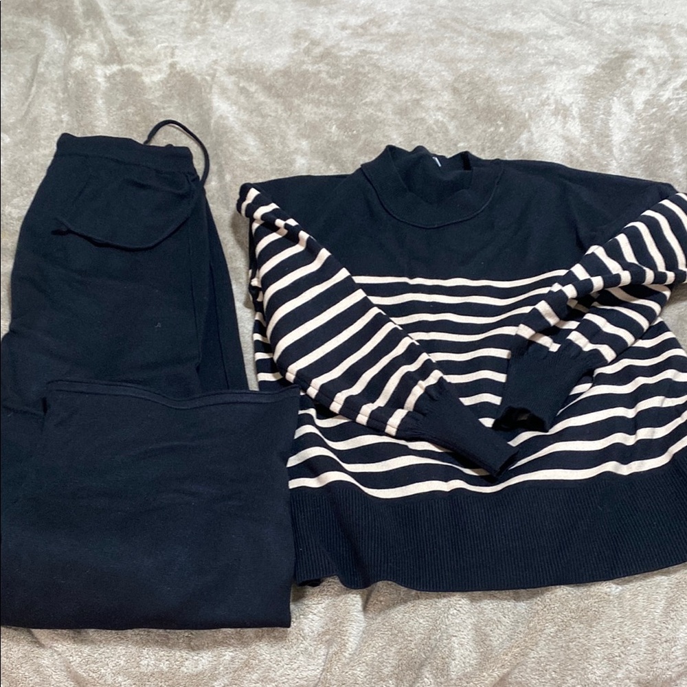 Striped Black and tan Sweater with Black Pants